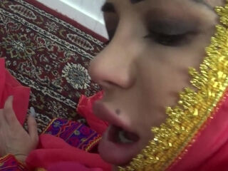 A mature, curvaceous Arab stepmother engages in sexual relations with her eighteen-year-old stepson.