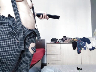 Sexy mom has fun trying on clothes and cutting them.