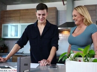 Busty cougar Wendy Raine is amazed by her boyfriend's son's big cock