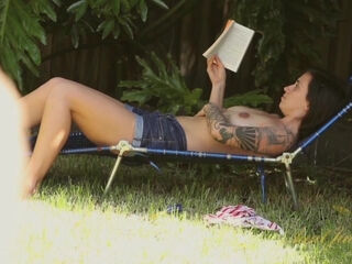 Liandra Dahl touches herself outside