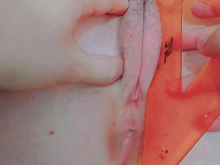 measuring every inch of her tight pussy and opening it tightly