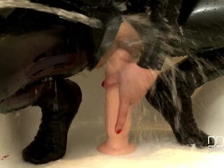 Bartroom dildoing in latex